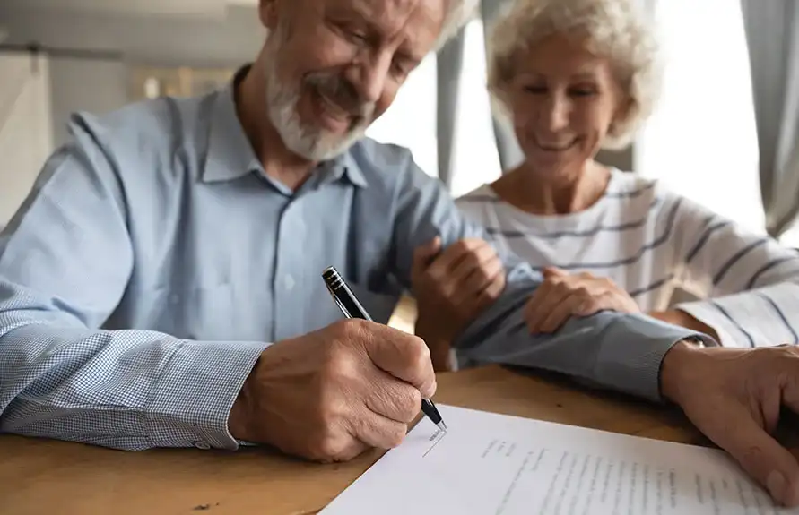 Elderly Signing Papers